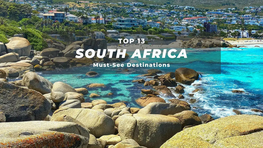 Vibrant coastal landscape showcasing one of South Africa's top 13 must-see destinations with rocky shore and clear blue waters.
